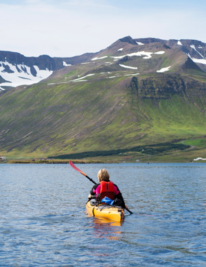 Woman Kayaking In Iceland