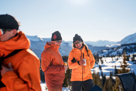 Keep skiing, then take a break and drink a local beer with your friends