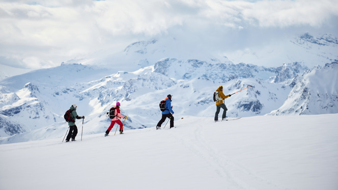 A group ski touring in the Alps.