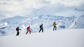 A group ski touring in the Alps.