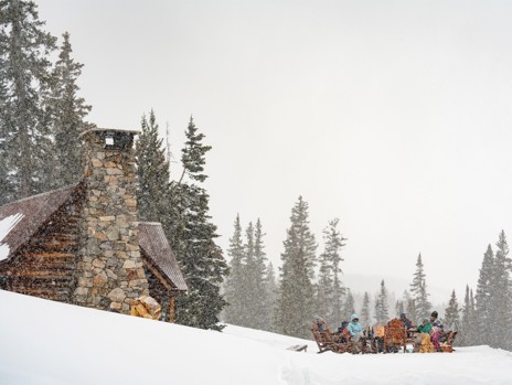 Group gathers outside the Movie Cabin in winter
