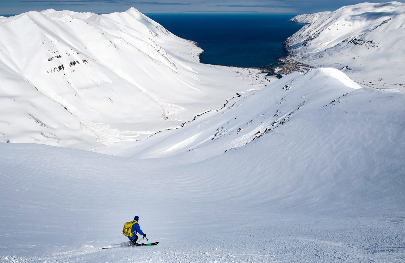 A skier descends in Iceland.
