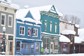Storefronts in a snowy downtown in Crested Butte.
